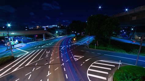 A Night Timelapse Of Traffic Jam At The City Intersection In Tokyo Wide