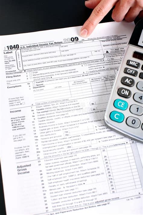 Income Tax Return and Calculator Editorial Photography - Image of file ...