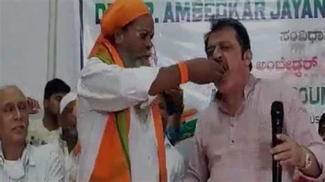 Congress Mla Bizzare Gesture Towards Caste Discrimination Feed Dalit Priest Then Eats The Same