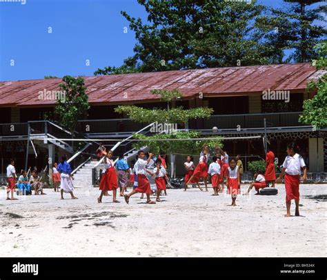 Samoan school children playing volleyball in school playground, Upolu ...