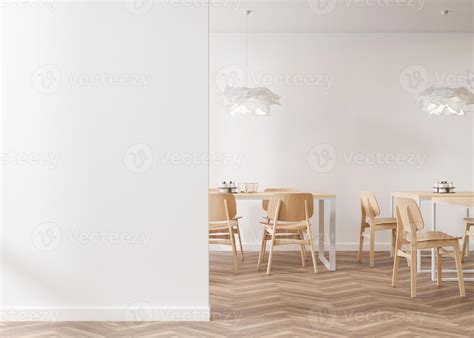Empty white wall in modern cafe. Mock up restaurant interior in