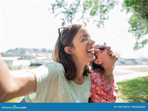 Girlfriends Taking Selfie Together Having Fun Outdoors Concept Of Modern Women Friendship