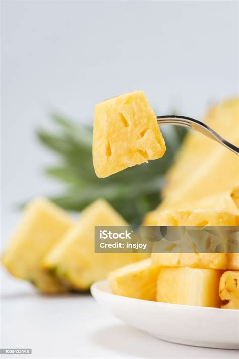 sliced pineapple isolated  white background stock photo
