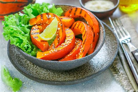 Delicious Light Salad Of Grilled Pumpkin Slices And Lettuce Stock Image