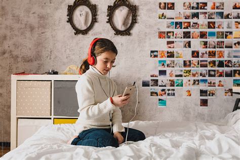 Girl Listening Music In Her Room By Dejan Ristovski Stocksy United