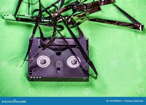 Tape Pulled Out from Mini Dv Format Video Cassette Tape Stock Photo - Image of beta, mini: 147209262