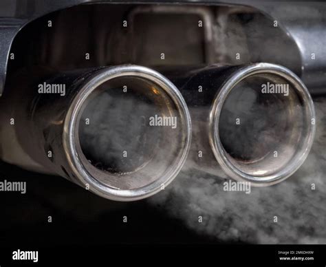 Smoking Car Exhaust Stock Photo Alamy