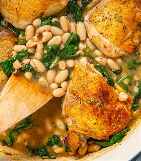 Skillet Chicken Thighs With Spinach And White Beans Basil And Bubbly