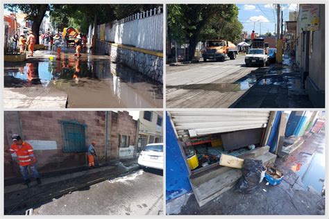 Labores de limpieza en la calle 10 Sur tras inundación por fuertes