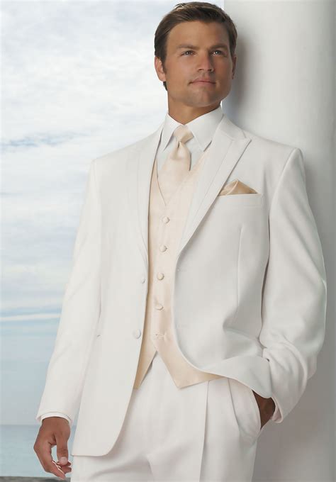 Ivory Wedding Dress And White Tuxedo at Noble Sneed blog