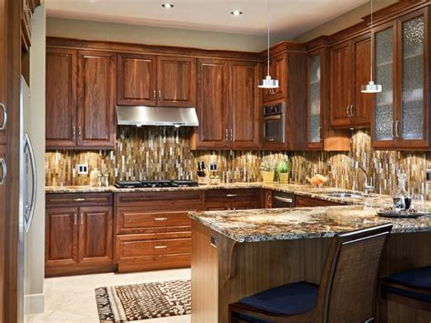 Vertically Hung Mosaic Tile Creates A Dramatic Backsplash In This