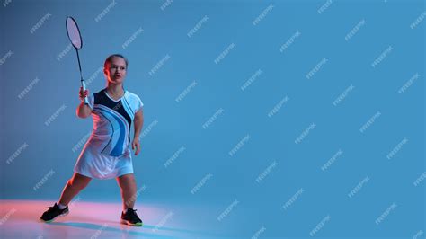 Free Photo Motion Beautiful Dwarf Woman Practicing In Badminton