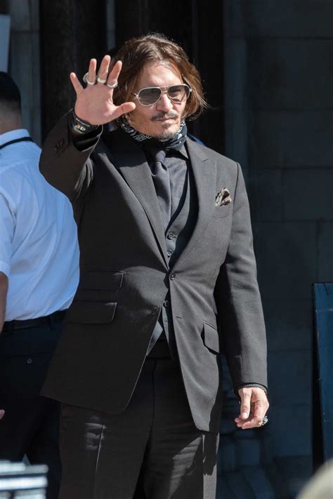 Johnny Depp in a Gray Suit Arrives at the Royal Courts of Justice in ...