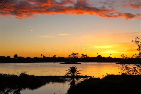 Lagoon sunset stock image. Image of travel, coastal, silhouette - 81794685