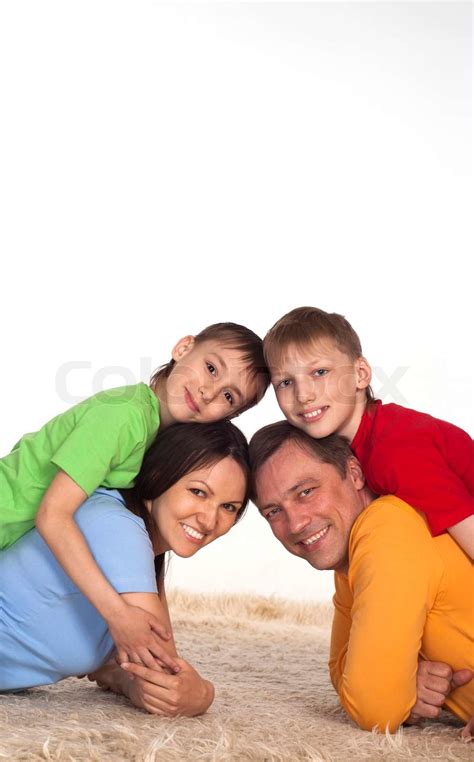 Lykkelig Familie P Et T Ppe Stock Foto Colourbox