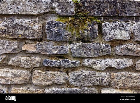 Background A Dry Stone Wall Built With Cotswold Stone At Burford In