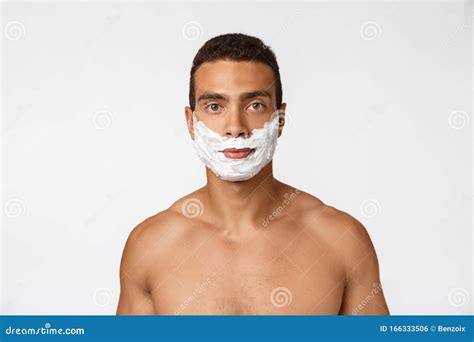 Close Up Of A Happy Naked African Man With Face In Shaving Foam Over