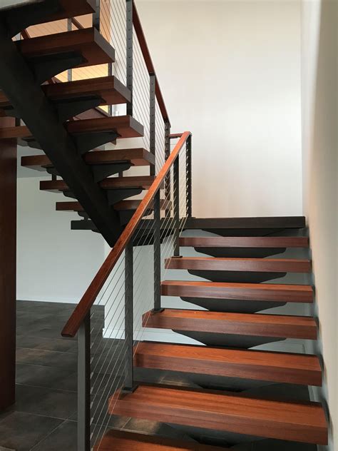 Floating Stairs With Cable Railing And Wood Treads Stairs Floating