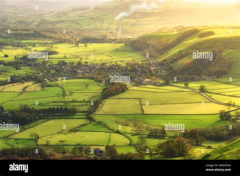 Green Landscape Of Farm Fields And Village View In Peak District