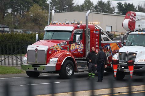 Dump Truck Strikes Overpass Causes Road Closure