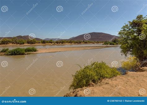 Landscape At The Kunene River Border Rivers Of Namibia And Angola