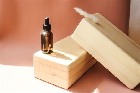 Premium Photo Blank Amber Glass Essential Oil Bottle