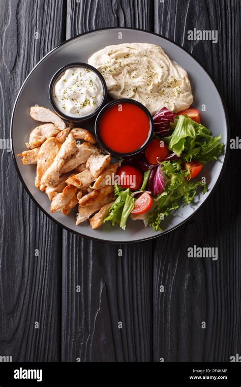 Mediterranean Chicken Shawarma Bowl With Hummus Vegetables Salad And