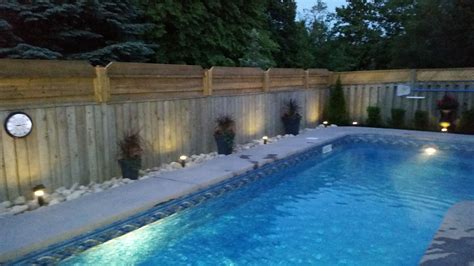 Small Low Maintenance Landscaping by a pool | Landscape design, Low ...