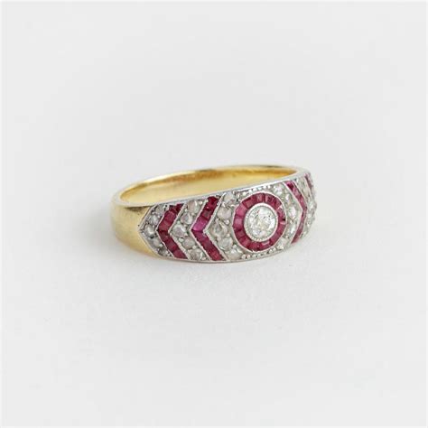 Anillo oro 18 K brillante rubíes y diamantes Zorrilla