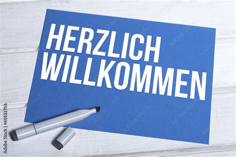 Herzlich Willkommen Blaue Tafel Mit Schrift Stock Photo Adobe Stock