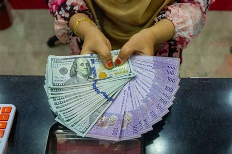 Ringgit Opens Slightly Higher Against US Dollar Malay Mail