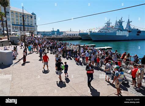 Visitors to the South African Navy Open Day waiting to board frigates ...