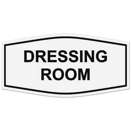 a white and black sign that says dressing room