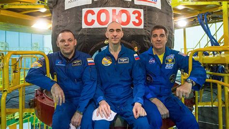 Three astronauts reach ISS, after low-key launch and a month spent ...