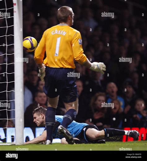 Aston Villa's James Milner slides on the floor after after his team ...