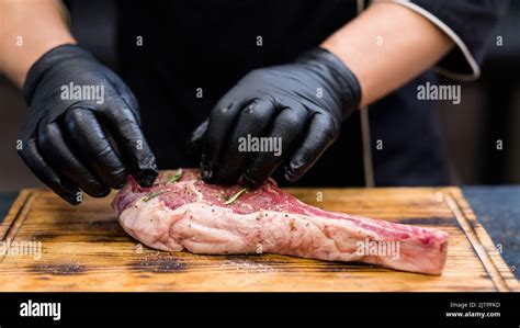 steakhouse kitchen cowboy steak seasoning meat Stock Photo - Alamy