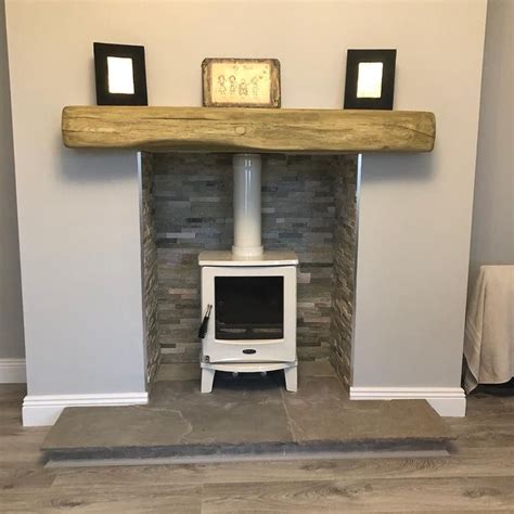 Cream Enamel Stove With Stone Cladding Geocast Beam Limestone Hearth A