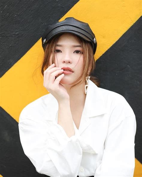 Asian Girl In Stylish Black Hat