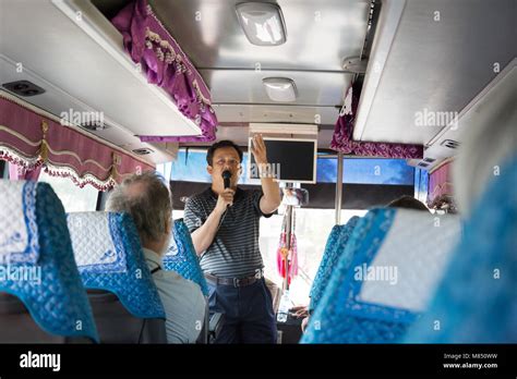 Tour guide talking on coach hi-res stock photography and images - Alamy