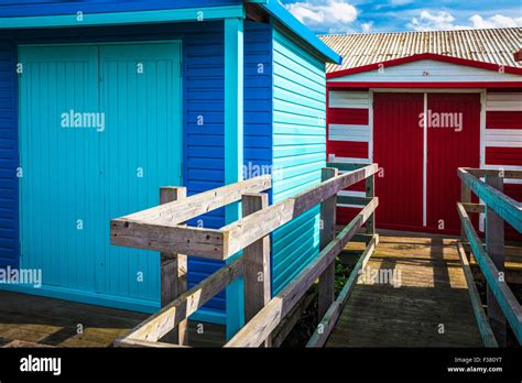 Colourful Wooden Beach Huts In The Kentish Coastal Resort Of Whitstable