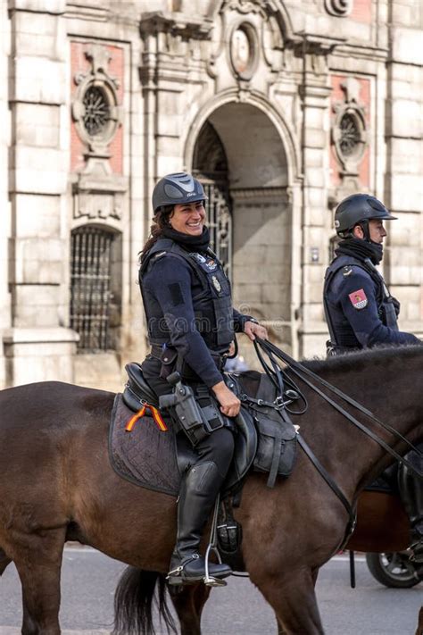 Spanish Mounted Police Forces Patrolling Through The Touristic Spots In