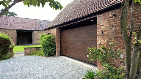 Dark Oak Sectional Garage Door in Gloucestershire - Elite GD