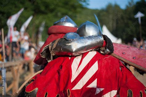 Detail of medieval blacksmith's clothing, tools and weapons in the ...