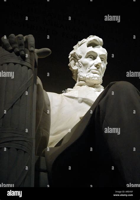 View of the statue of Abraham Lincoln in the Lincoln Memorial at night ...