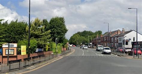 Police Tape Off Main Road Following Reports Of Person Hit By Car