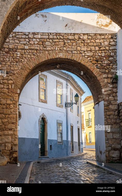 Resting Arch In Medieval Walls Is One Of 4 Entrances To The Old Town In