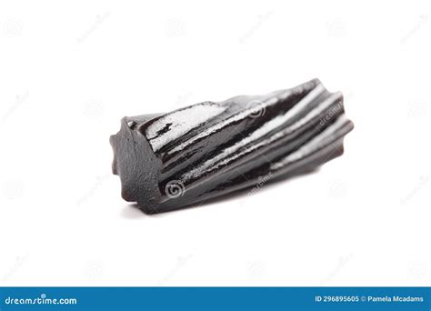 Classic Black Licorice Pieces Isolated On A White Background Stock