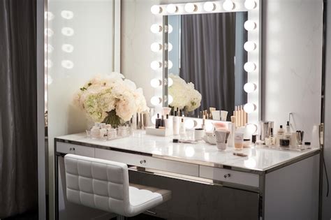 Premium Photo | White vanity with a hollywoodstyle mirror