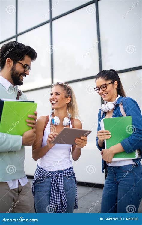 Group Of Friends Studying Together At University Campus Stock Photo