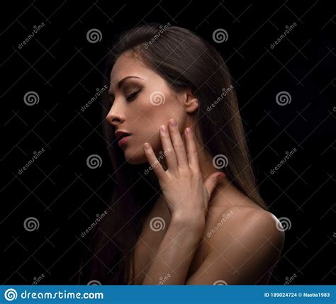 Beautiful Woman With Nude Healthy Shoulder And Healthy Skin Neck Isolated On Black Studio